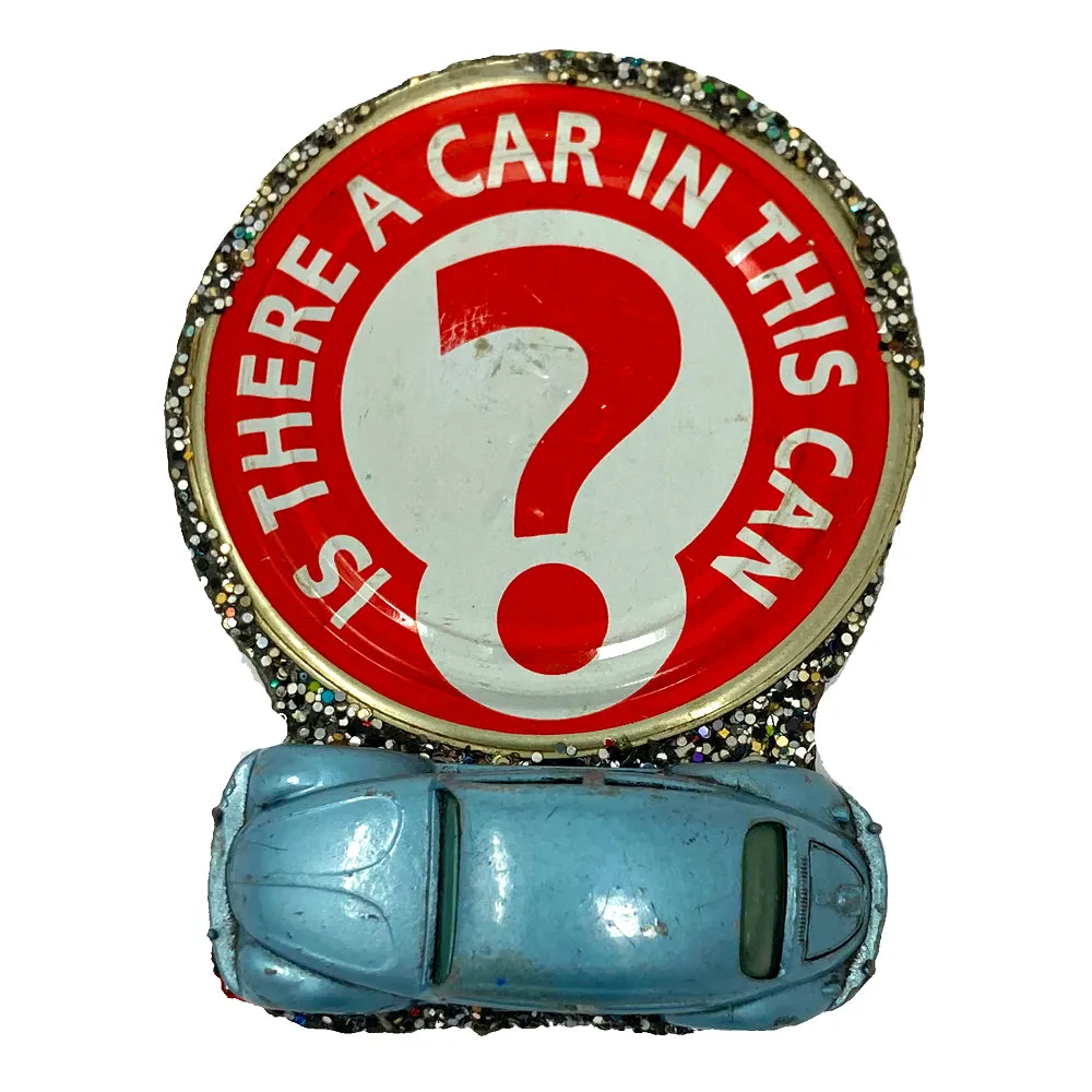 IS THERE A CAR IN THIS CAN BROOCH